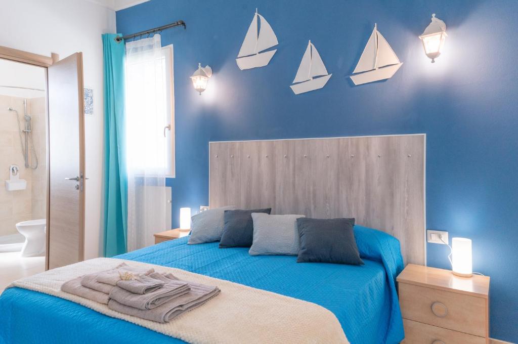 Postel nebo postele na pokoji v ubytování B&B Nell'Isola