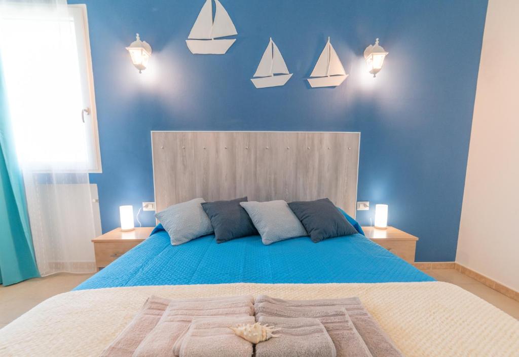 Postel nebo postele na pokoji v ubytování B&B Nell'Isola