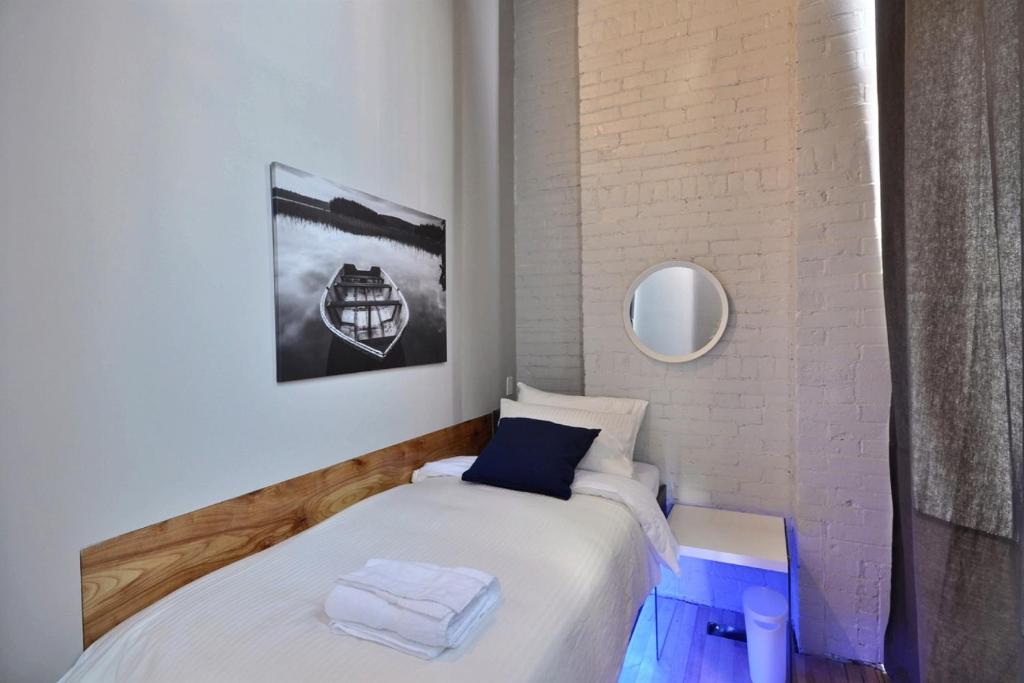 Postel nebo postele na pokoji v ubytování Zens Inn