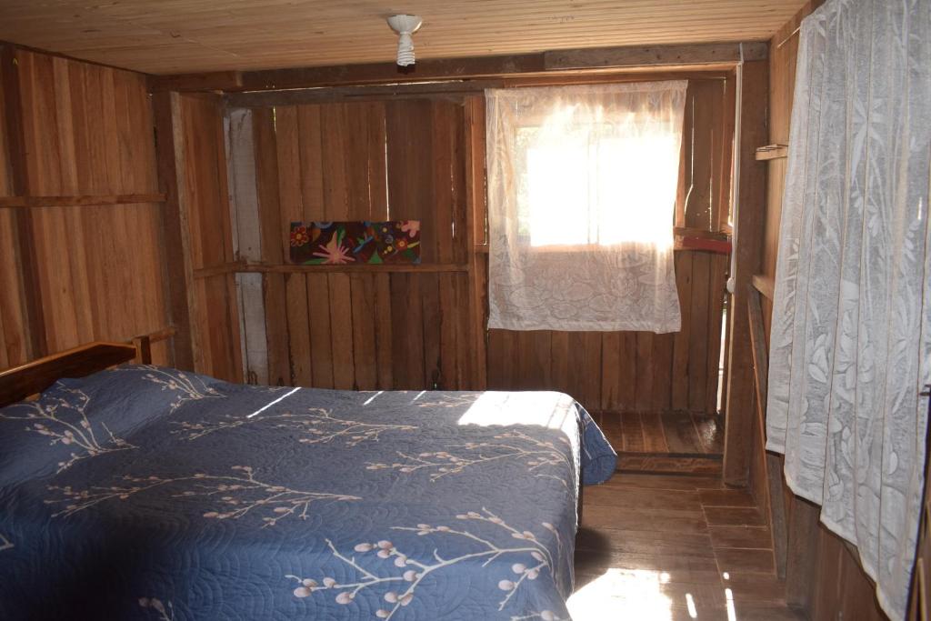 Postel nebo postele na pokoji v ubytování Casa Hospedaje Tingomaria
