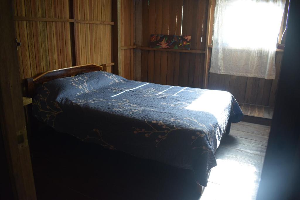 Postel nebo postele na pokoji v ubytování Casa Hospedaje Tingomaria