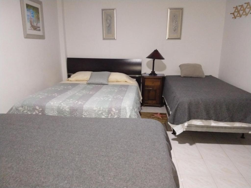 Postel nebo postele na pokoji v ubytování Casa De Polita