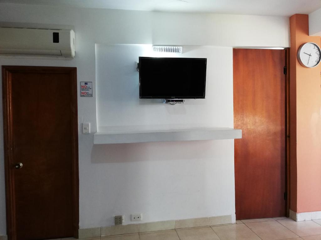 TV a/nebo společenská místnost v ubytování Posada Smith Town