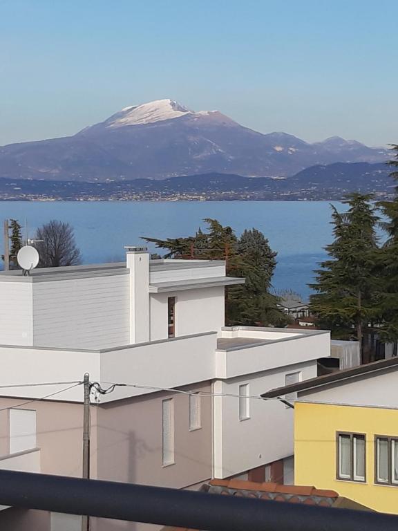 a view of a snow covered mountain from a building at Villa Marianna Garda Lake in Peschiera del Garda