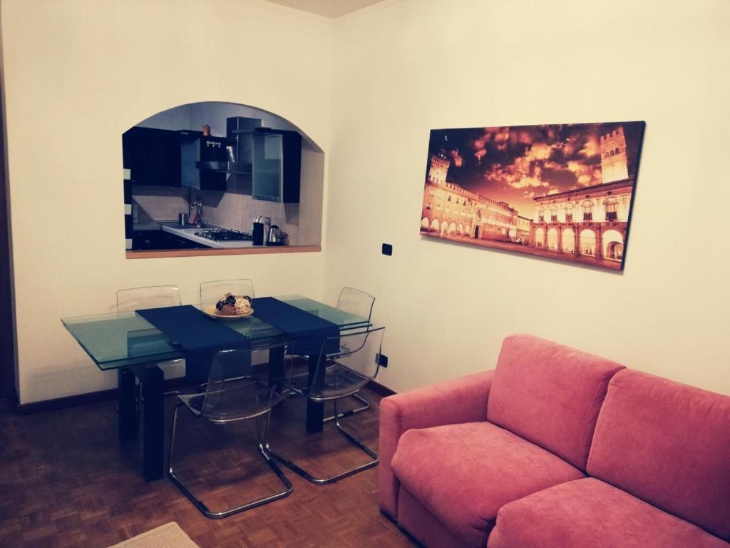 a living room with a couch and a table at Residence Vigliani in Milan