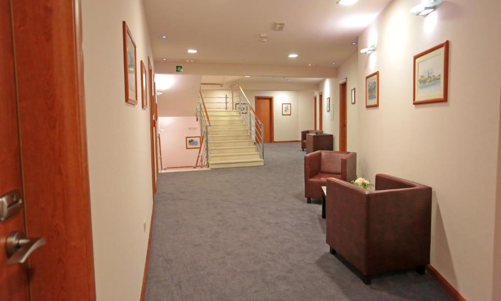 Posedenie v ubytovaní Hotel As