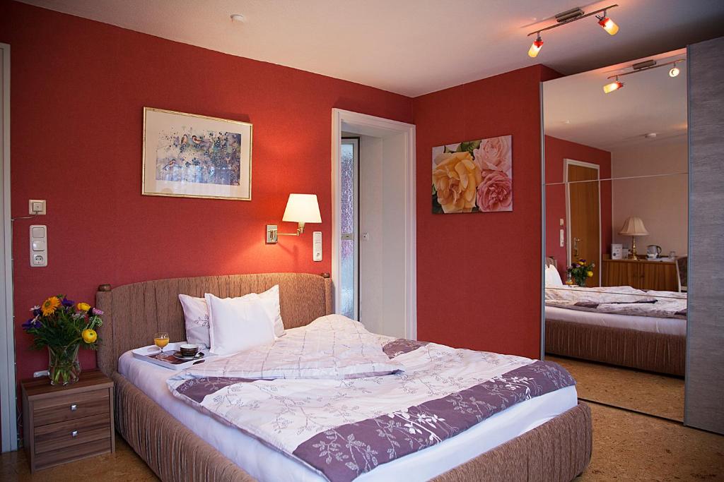 Postel nebo postele na pokoji v ubytování Kurhotel Weber