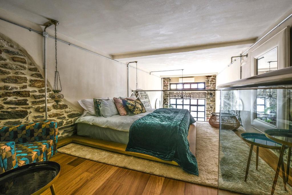 Posteľ alebo postele v izbe v ubytovaní Akakia’s house
