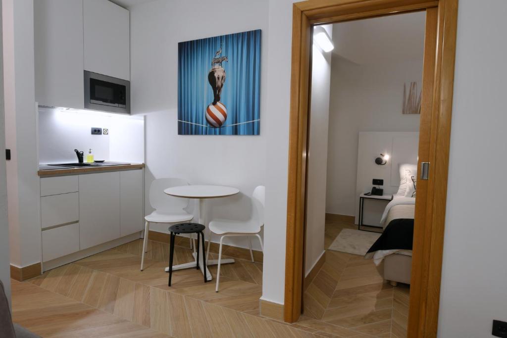 Kuchyň nebo kuchyňský kout v ubytování Aparthotel Milenij