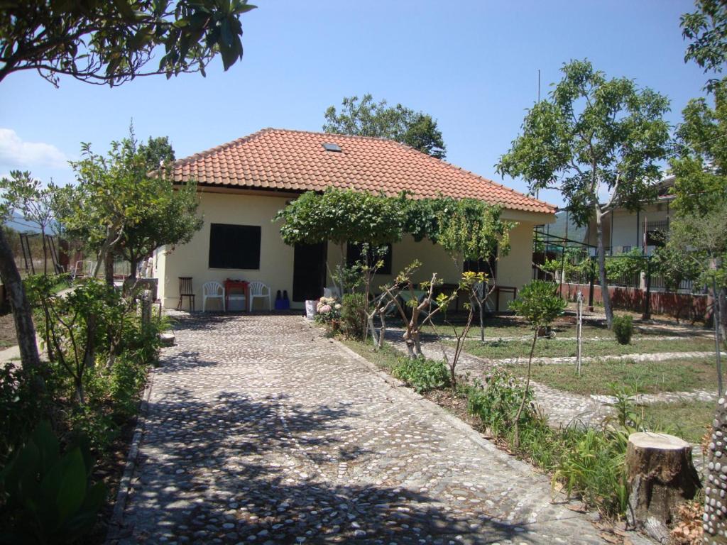 a house with a pathway in front of it at Asprovalta Istos house in Asprovalta