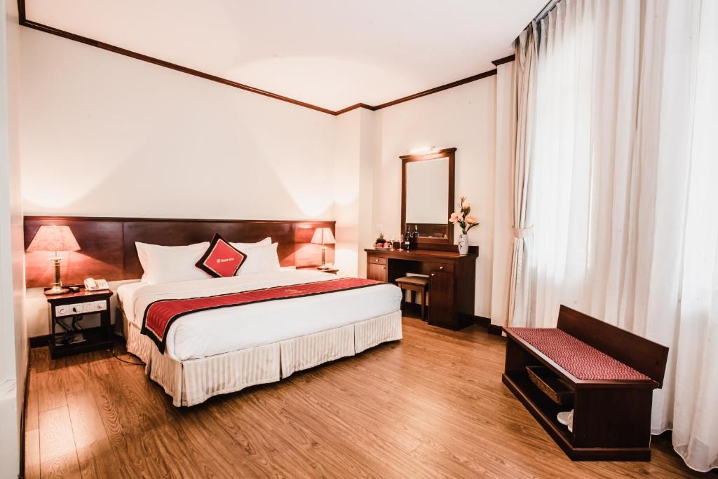Postel nebo postele na pokoji v ubytování S79 Sunny Hotel 2