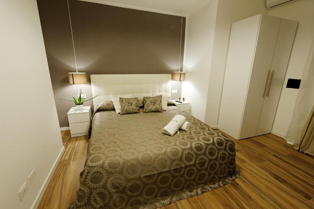 Postel nebo postele na pokoji v ubytování Gocce di Girgenti - comfort suites