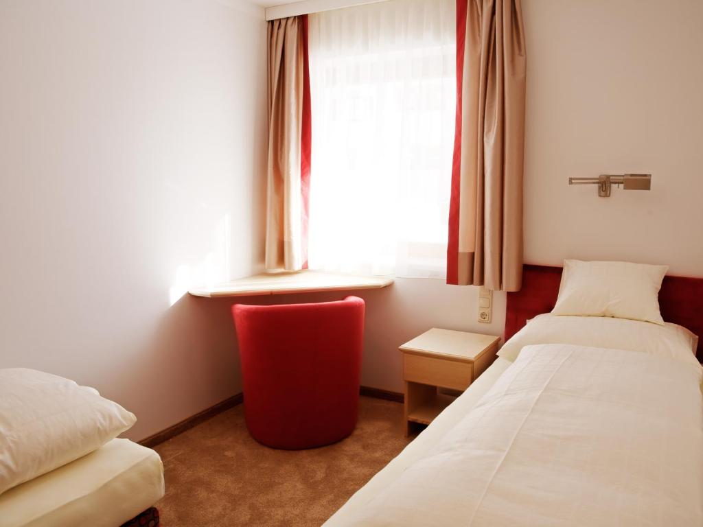 Postel nebo postele na pokoji v ubytování Pension Grissemann