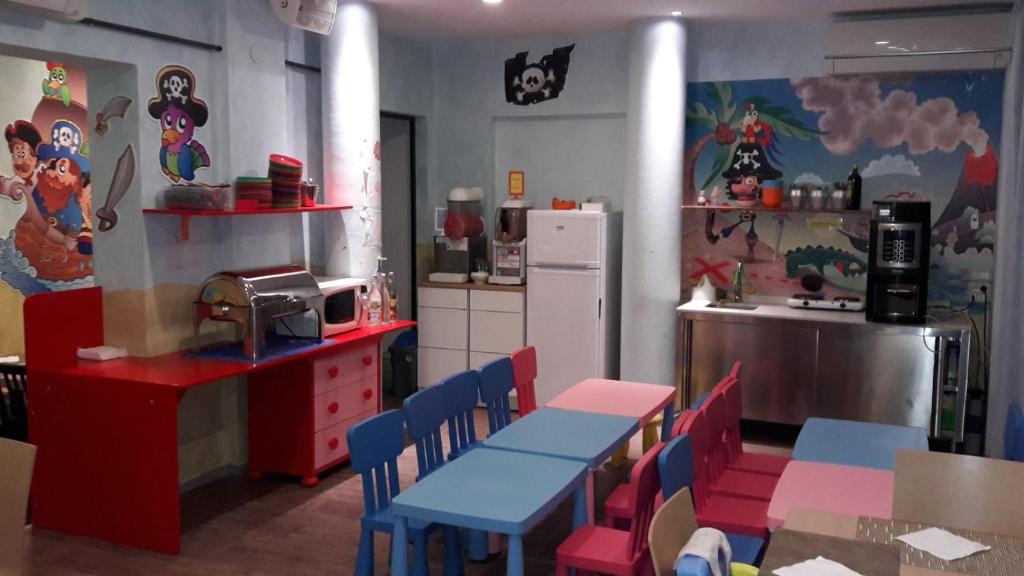 Kuchyň nebo kuchyňský kout v ubytování Baby Family Hotel Alda Amelia