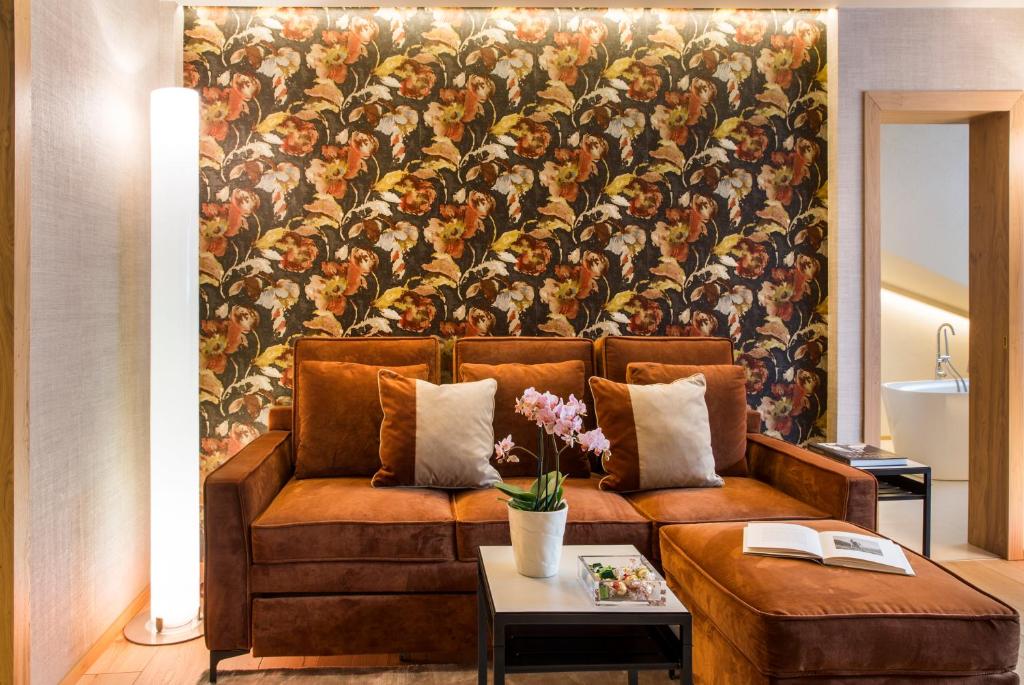 Posezení v ubytování Hotel Hermitage Relais & Châteaux