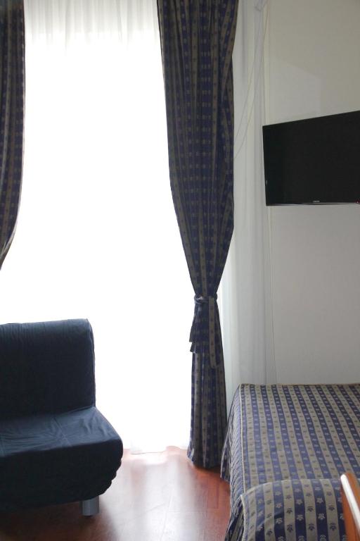 TV a/nebo společenská místnost v ubytování B&B Luna Blu
