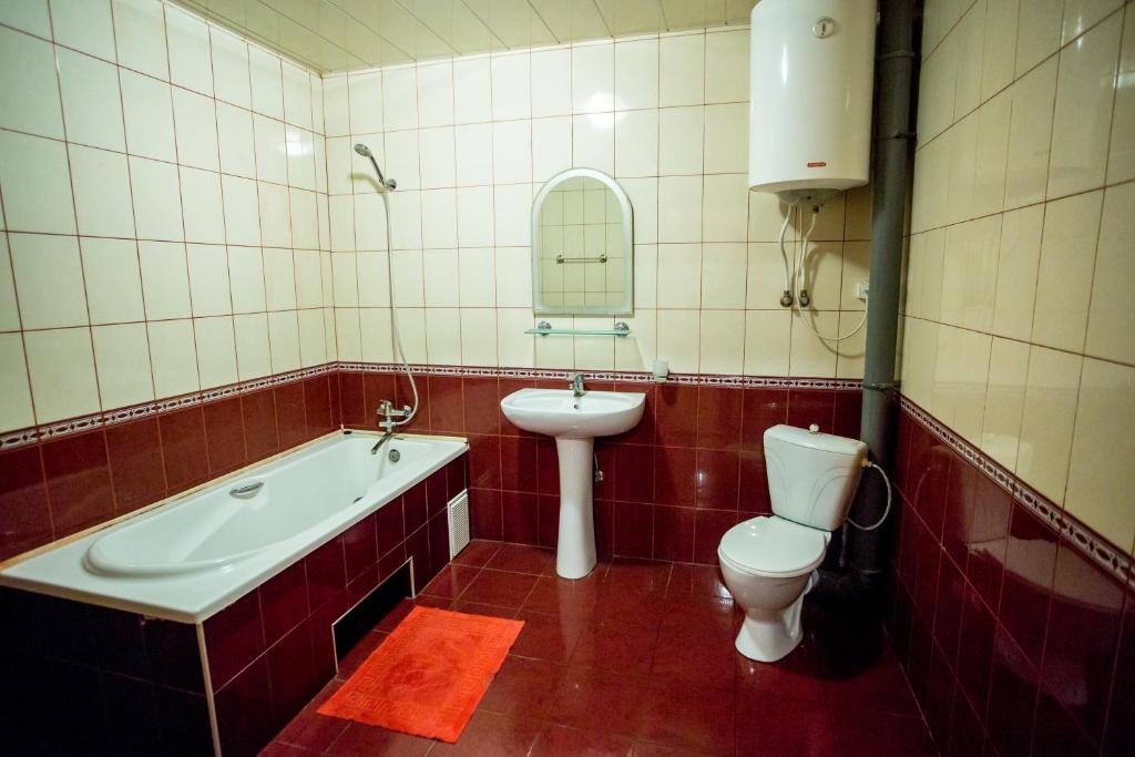 Koupelna v ubytování Premium Hotel