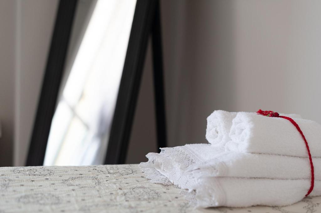 Postel nebo postele na pokoji v ubytování Sottovento B&B