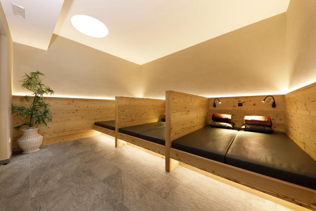 Postel nebo postele na pokoji v ubytování Das Mitterplarser Hotel