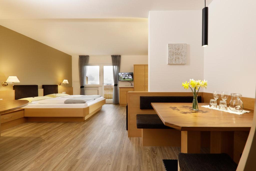 Postel nebo postele na pokoji v ubytování Das Mitterplarser Hotel