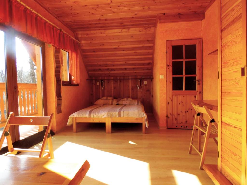 Postel nebo postele na pokoji v ubytování Domki - Pod Smerkami