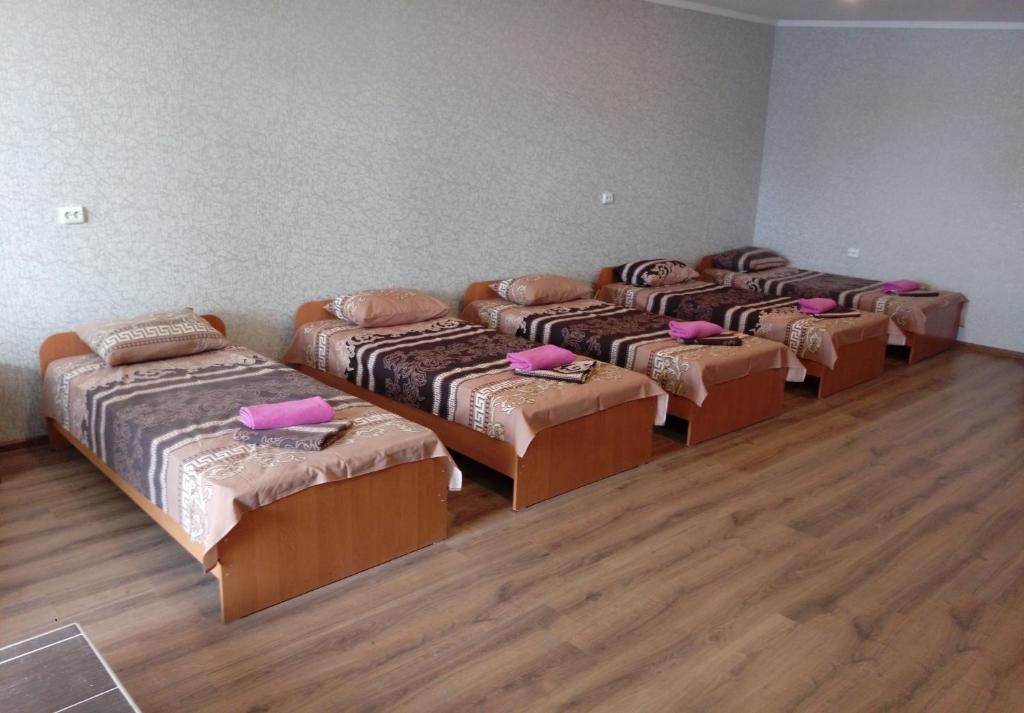 Postel nebo postele na pokoji v ubytování Premium Hotel