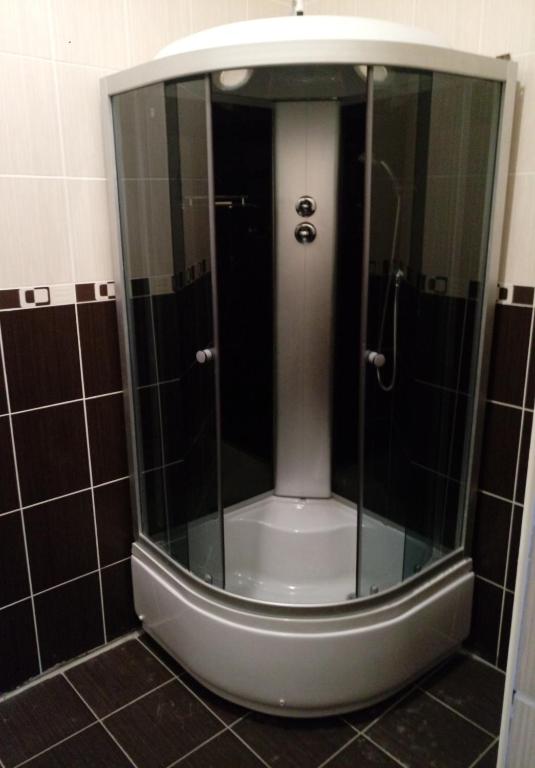 Koupelna v ubytování Premium Hotel