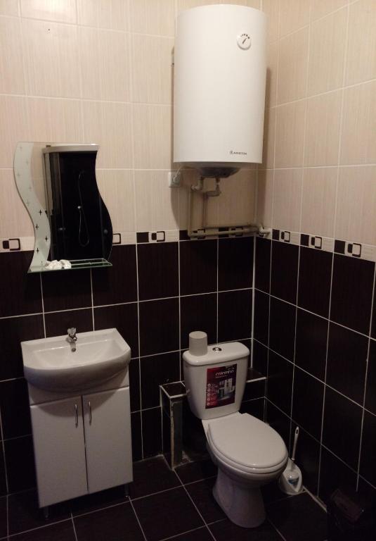 Koupelna v ubytování Premium Hotel