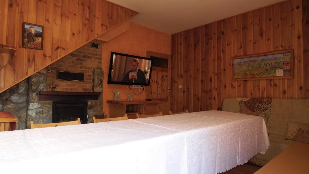 Postel nebo postele na pokoji v ubytování Domki - Pod Smerkami