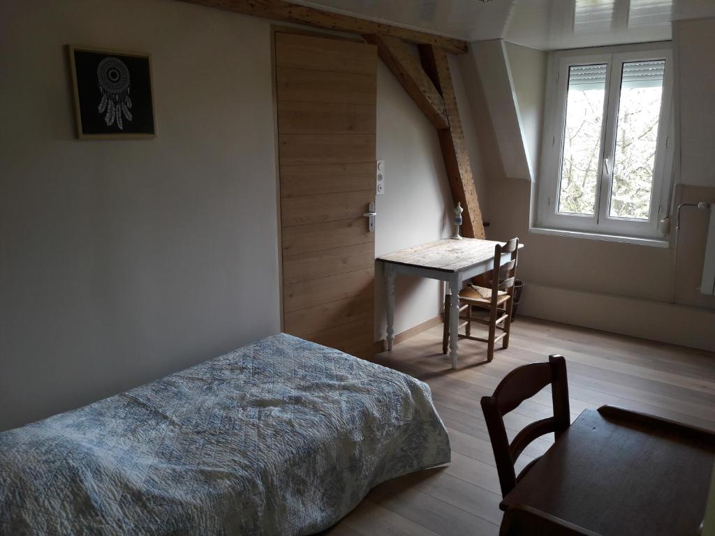 Postel nebo postele na pokoji v ubytování La Cense Hebron