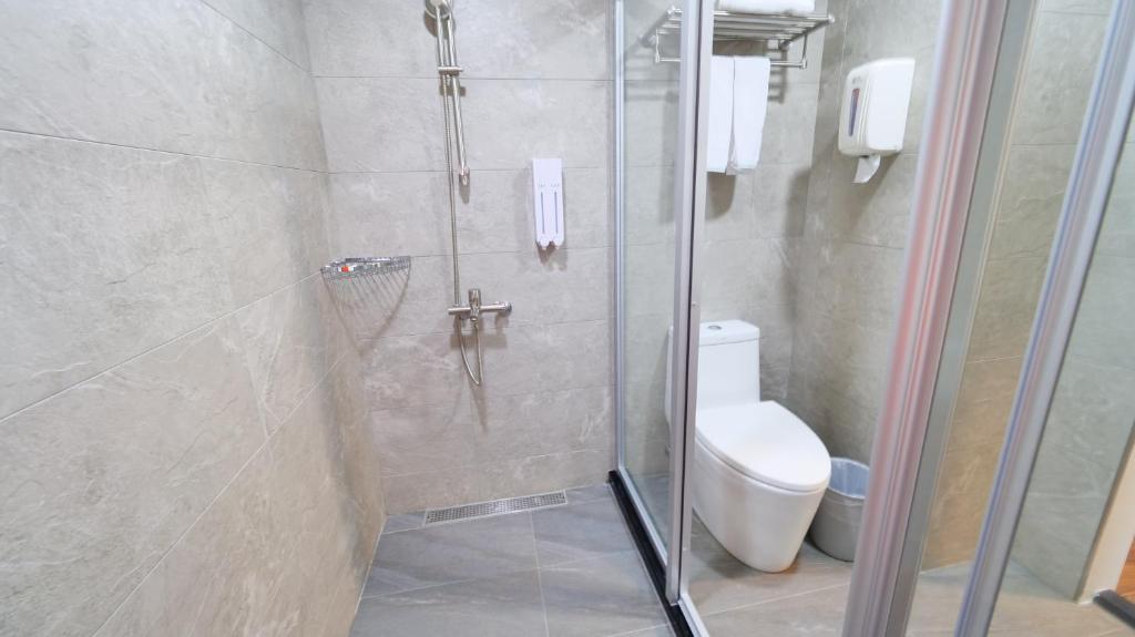 Koupelna v ubytování Apause Hotel