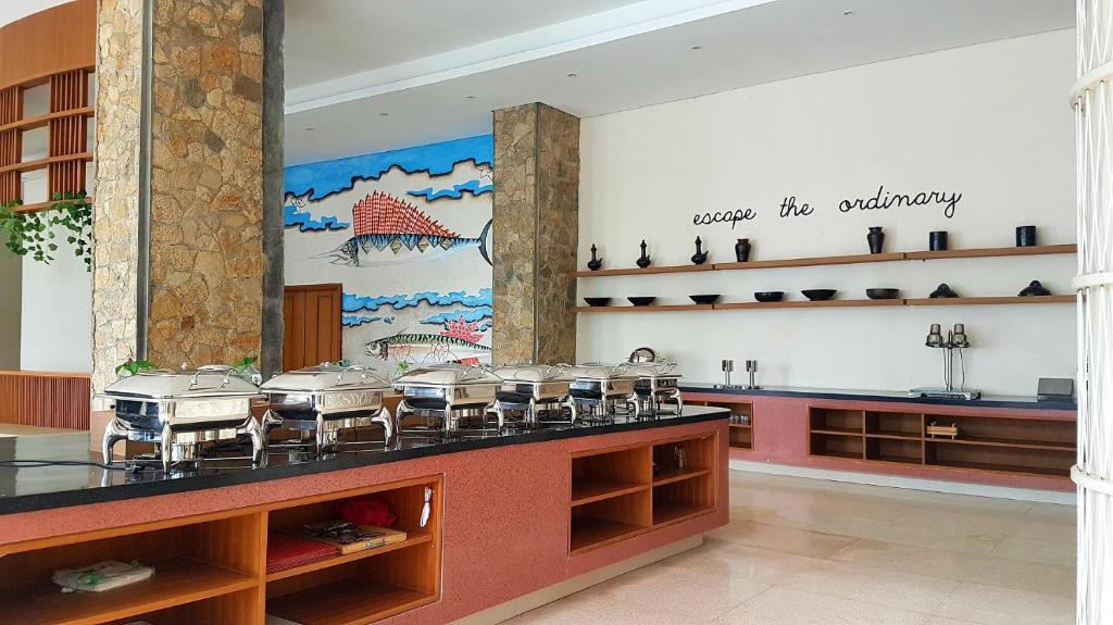 Kuchyň nebo kuchyňský kout v ubytování Louis Kienne Resort Senggigi