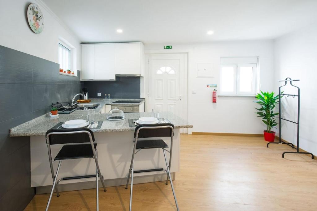 Kuchyň nebo kuchyňský kout v ubytování Dom Pipas Houses - Batista & Marcelino Lda