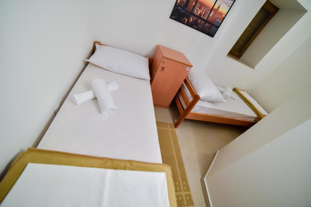 Postel nebo postele na pokoji v ubytování Hostel Sinj