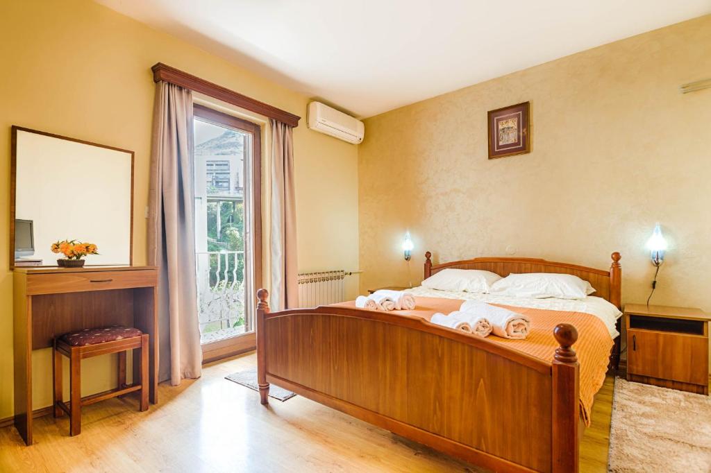 Postel nebo postele na pokoji v ubytování Mali Miločer Bay Accommodation