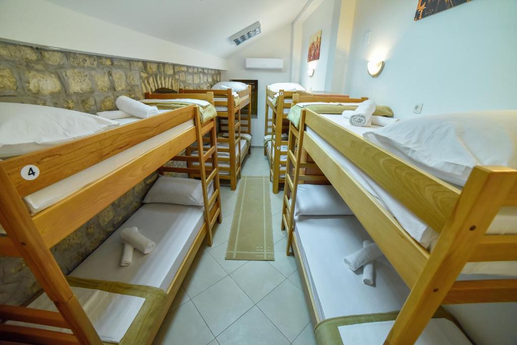 Postel nebo postele na pokoji v ubytování Hostel Sinj