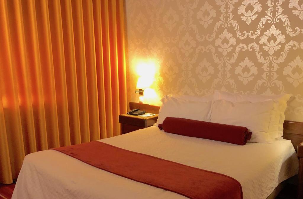 Postel nebo postele na pokoji v ubytování Hotel Eurosol Seia Camelo