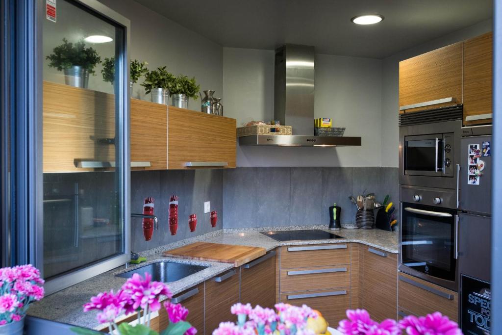 A kitchen or kitchenette at La Riega del Peral