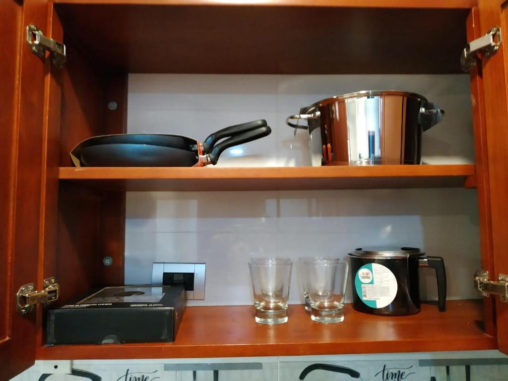 Kuchyň nebo kuchyňský kout v ubytování APARTAMENTOS DECOR