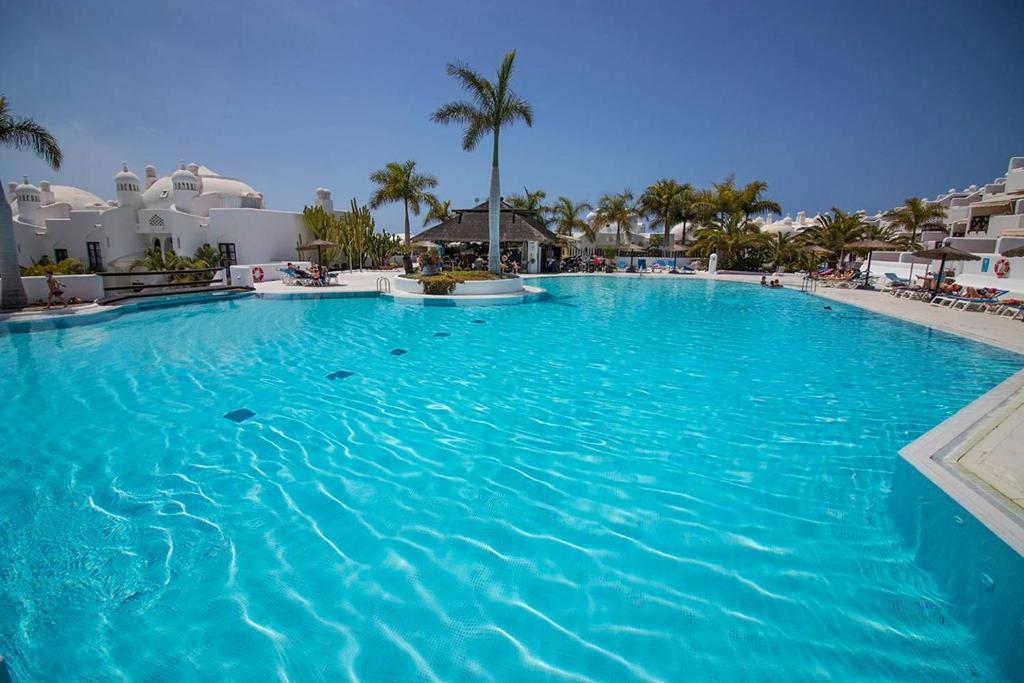 Bazén v ubytování Comfort e semplicità in Playa Paraiso nebo v jeho okolí