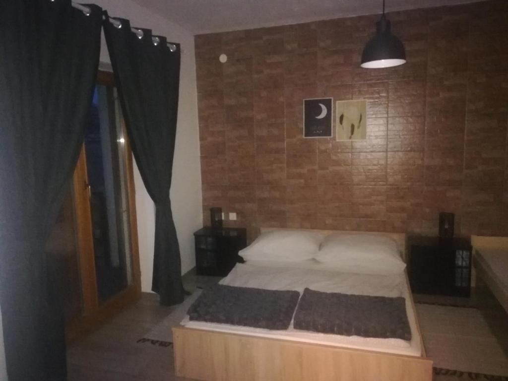 Postel nebo postele na pokoji v ubytování Apartmani Marin