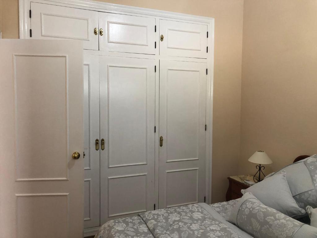 Postel nebo postele na pokoji v ubytování Malibu Playa Apartamento