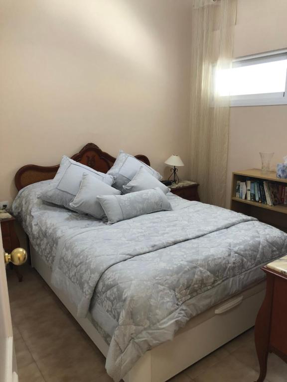 Postel nebo postele na pokoji v ubytování Malibu Playa Apartamento