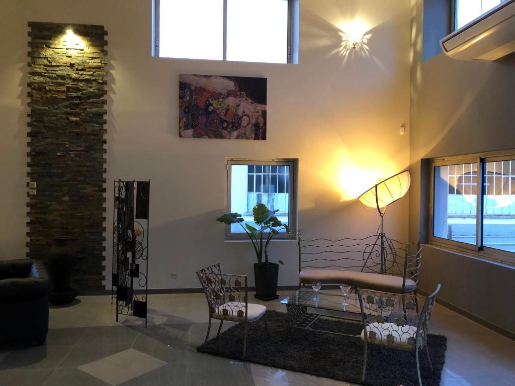 Posezení v ubytování Hôtel L'ange de la vallée