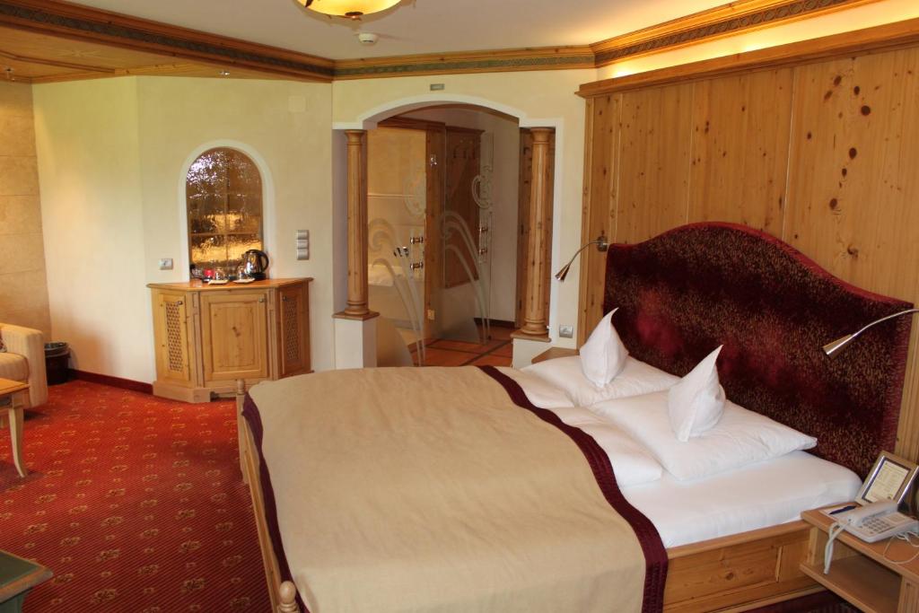 Postel nebo postele na pokoji v ubytování Wellnessresidenz Schalber