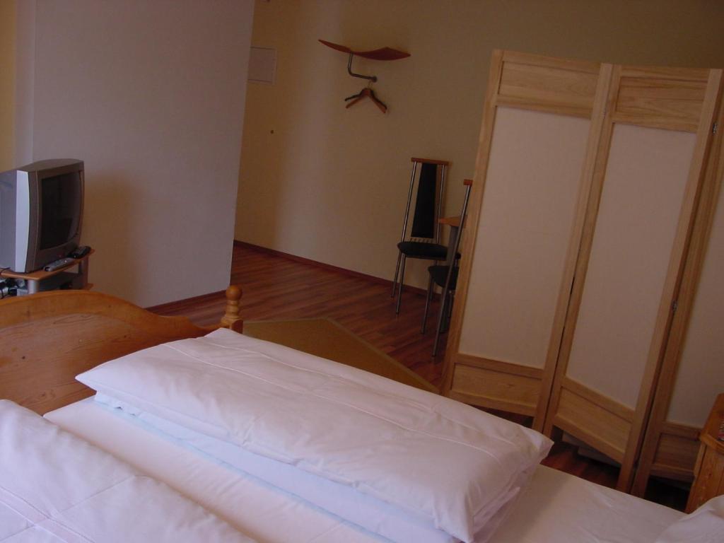Postel nebo postele na pokoji v ubytování Apart Huditz