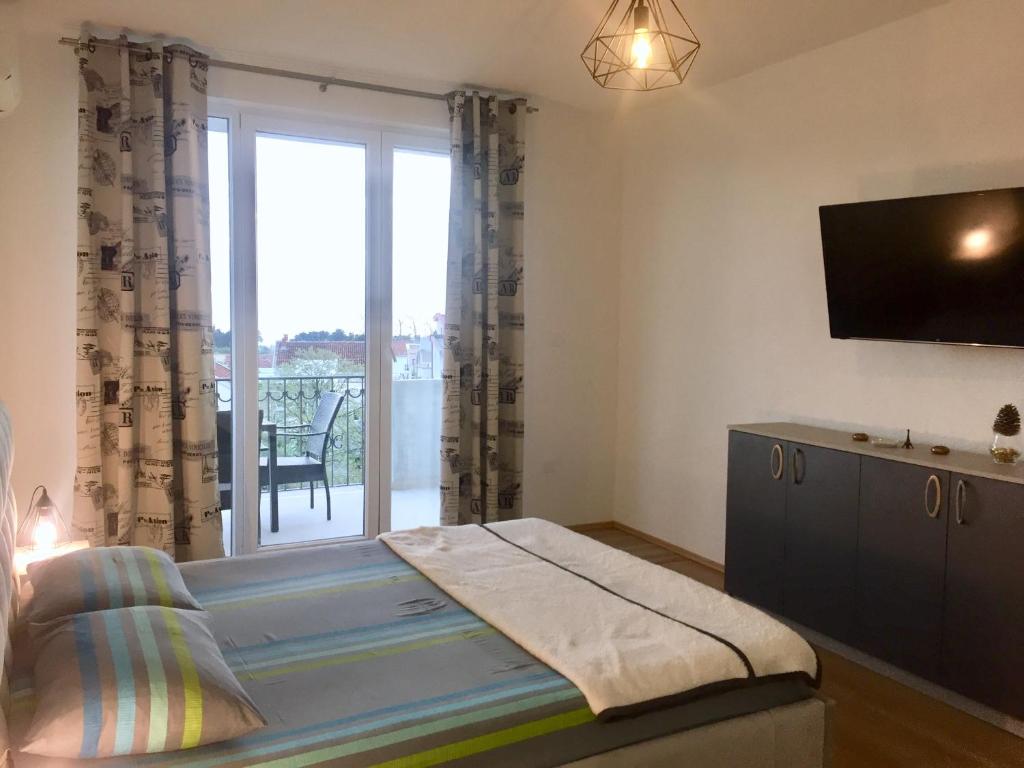 Кровать или кровати в номере Aparthotel Monterria
