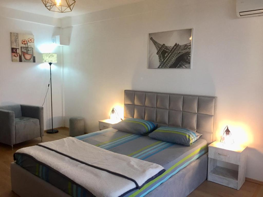 Кровать или кровати в номере Aparthotel Monterria