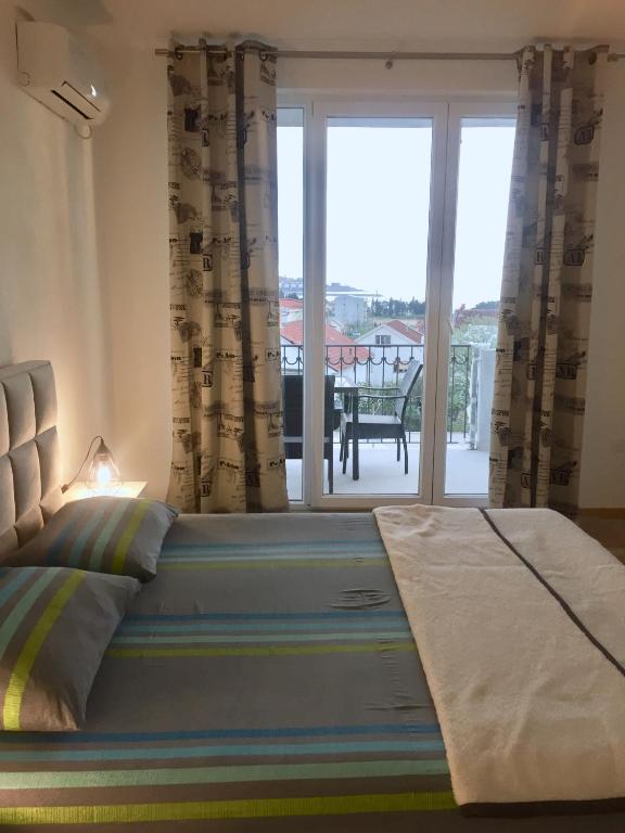 Кровать или кровати в номере Aparthotel Monterria