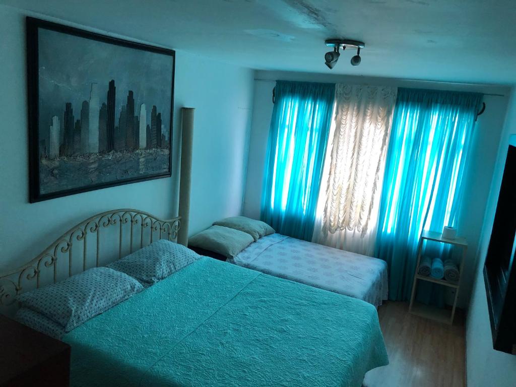 Postel nebo postele na pokoji v ubytování Casa La Minerva